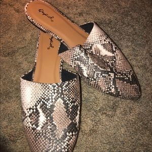 Snakeskin slip on flats